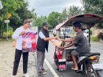 pertamina-patra-niaga-regional-sulawesi-bagi-3-300-takjil-gratis